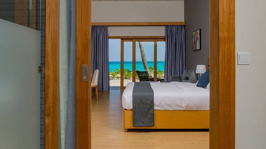 Fiyavalhu Beach Villa 臥室與海景